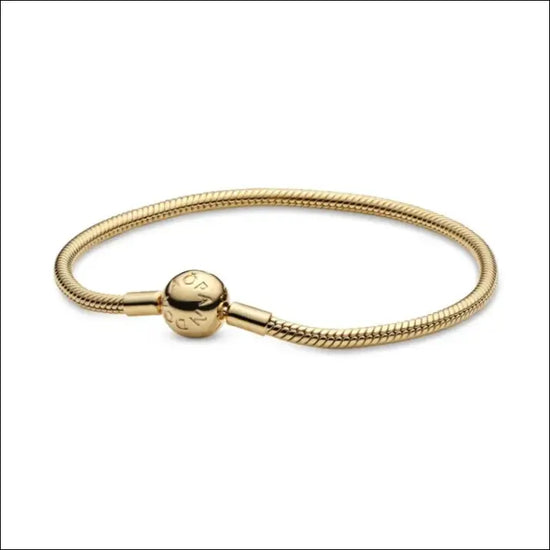 Armband med Snake Bone Länk och Rund Lås Guld Pandora