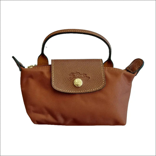 Longchamp Le Pliage Cognac stilren fransk minimalism - Mini Pack & Axelband - Sminkväska