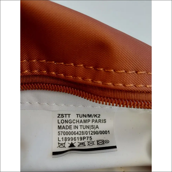 Longchamp Le Pliage Cognac stilren fransk minimalism - Mini Pack & Axelband - Sminkväska